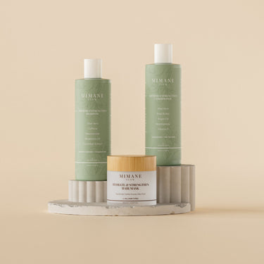 The Wash Day Trio: Nourish & Strengthen Shampoo, Nourish & Strengthen Conditioner, and Hydrate & Strengthen Hair Mask