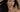 Woman with long black hair in motion