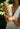 Mimane Glow Nourish and Strengthen wash being poured into an open palm