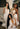 Three women holding Mimane Glow shampoo, conditioner, and hair oil