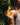 Hand holding Mimane Glow Growth and Strengthen Hair Oil dropper bottle